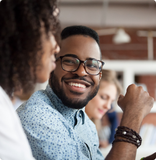 smiling male with glasses